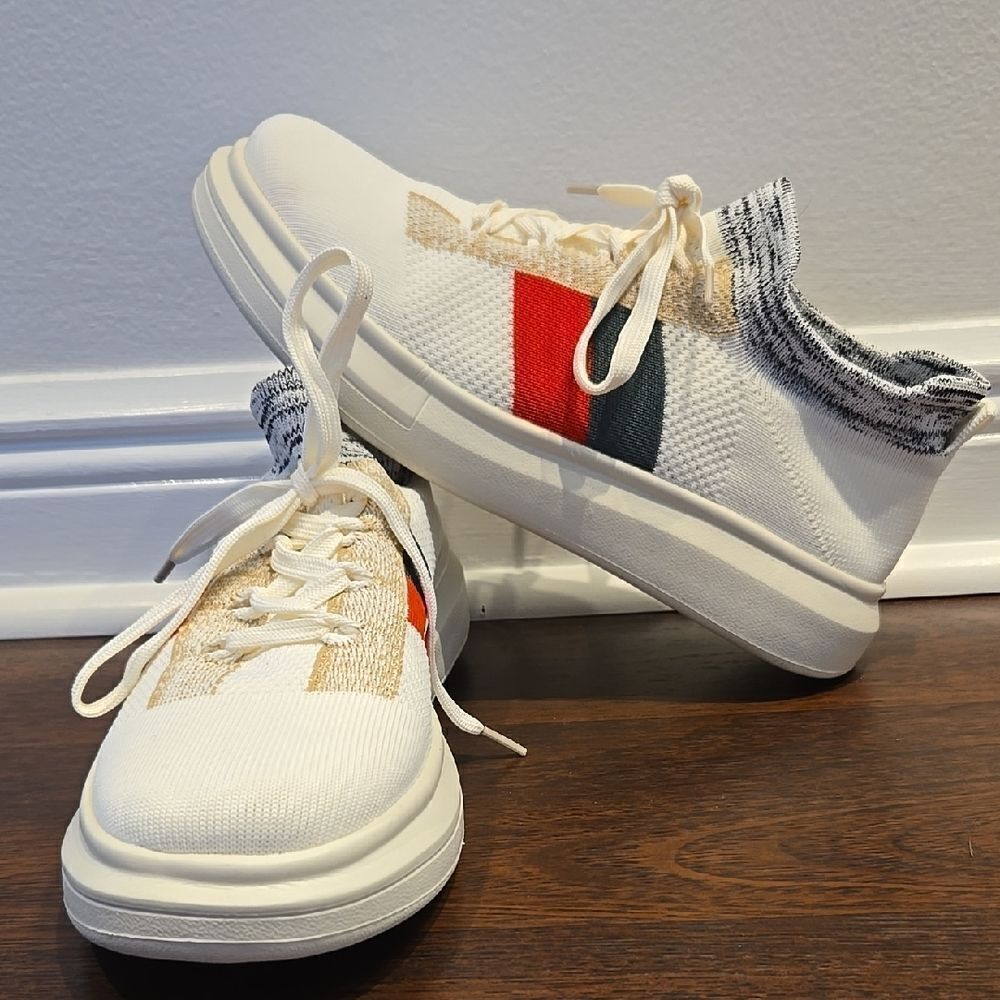 Stylish White Sneakers with Red and Green Accents